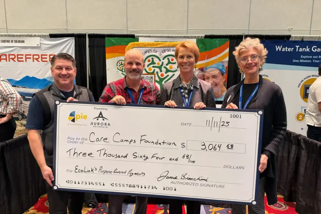 Ecolink presenting a big check to Care Camps Foundation