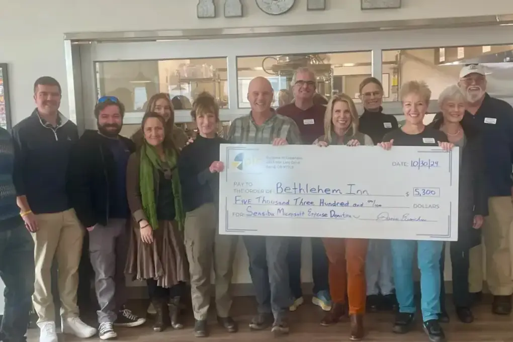 The Sensiba team with the PIE donation check funded by their Microsoft expense